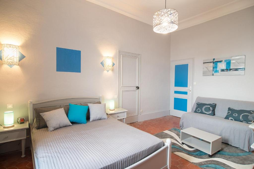 Postel nebo postele na pokoji v ubytování B&B Le Logis Du Mas