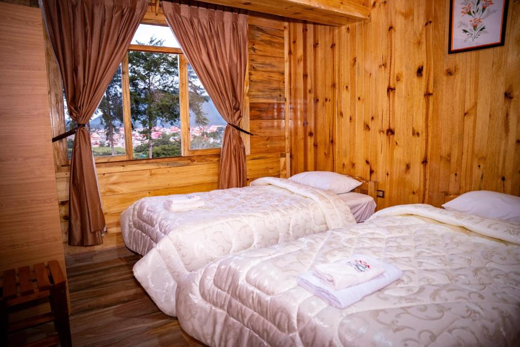 Postel nebo postele na pokoji v ubytování Fundo Hassinger