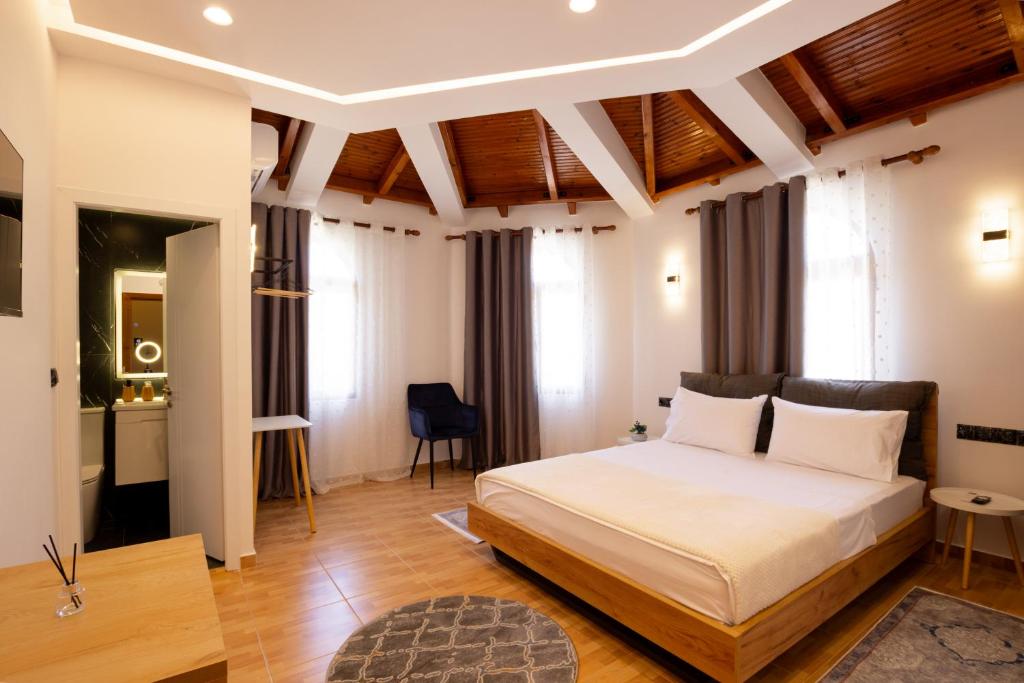 Postel nebo postele na pokoji v ubytování Villa EM