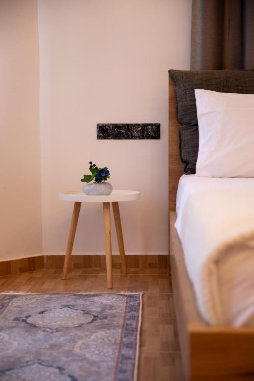 Postel nebo postele na pokoji v ubytování Villa EM