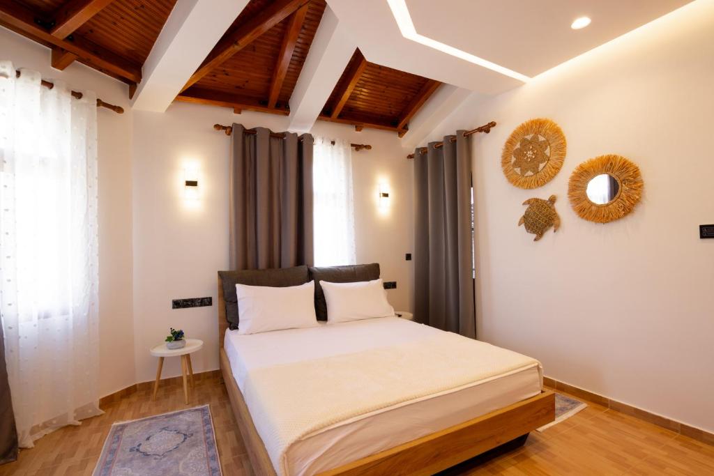 Postel nebo postele na pokoji v ubytování Villa EM