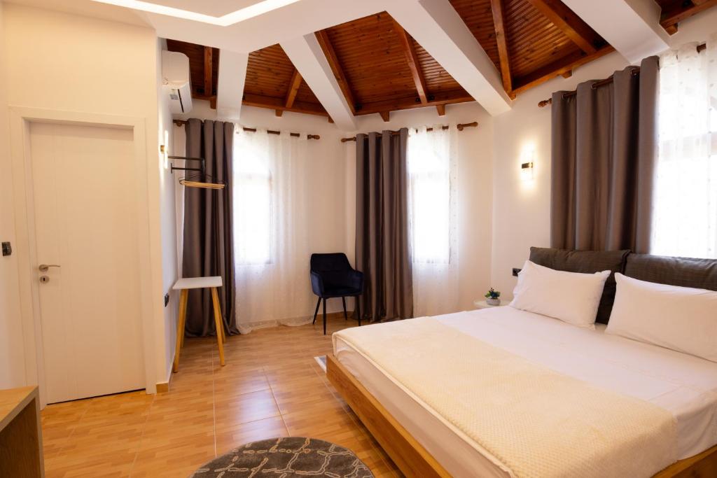 Postel nebo postele na pokoji v ubytování Villa EM