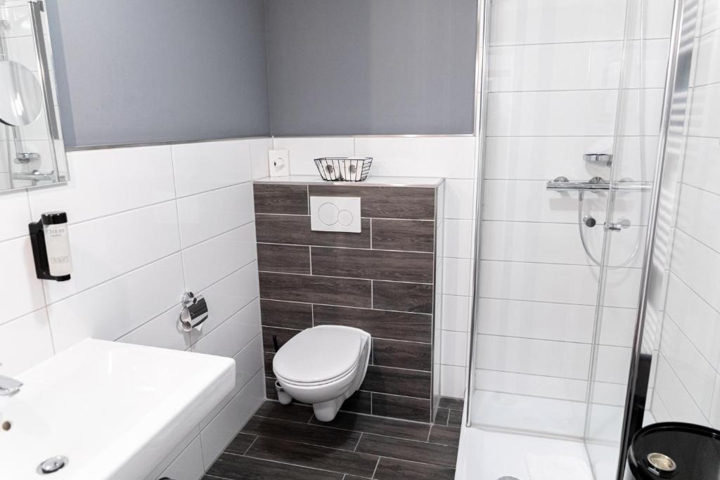 Koupelna v ubytování Krögers Hotel