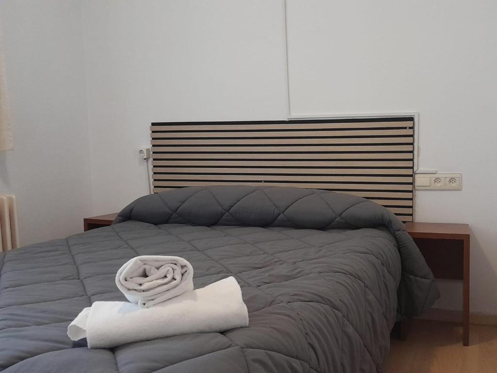 Postel nebo postele na pokoji v ubytování Apartamentos 3000 Formigal