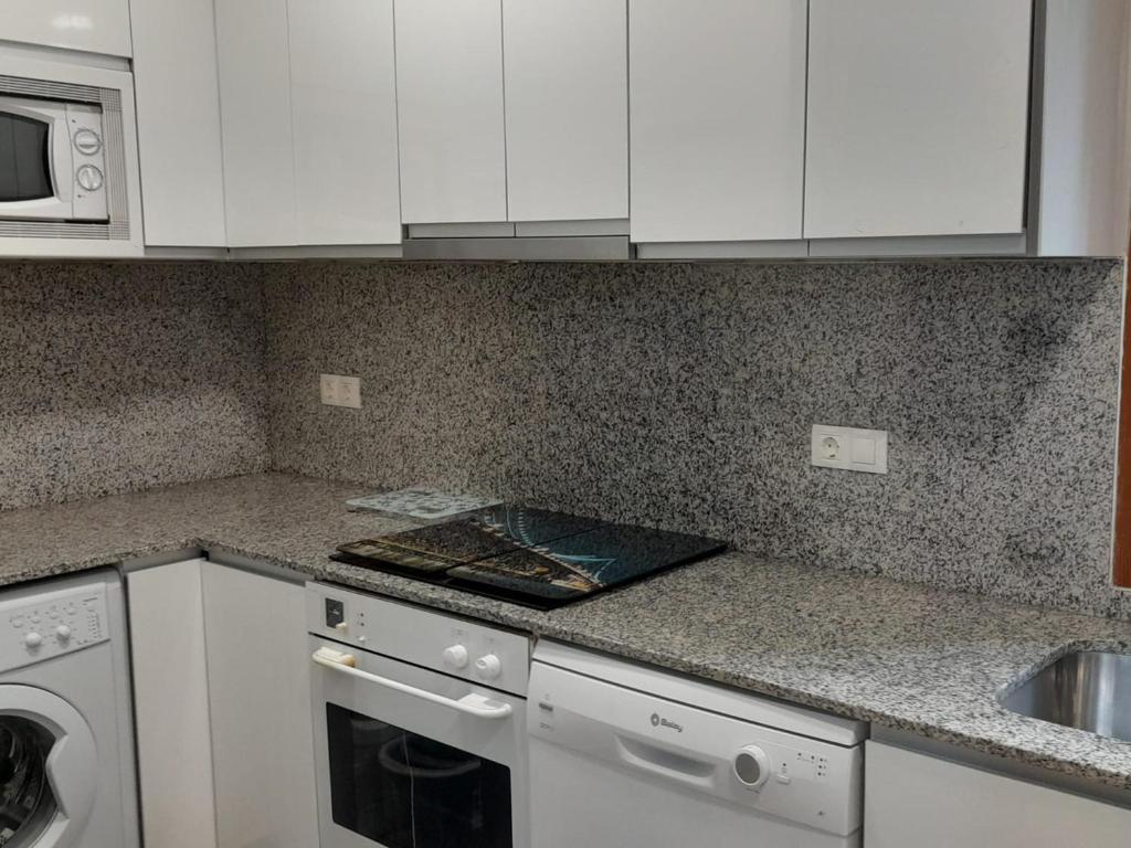 Kuchyň nebo kuchyňský kout v ubytování Apartamentos 3000 Formigal
