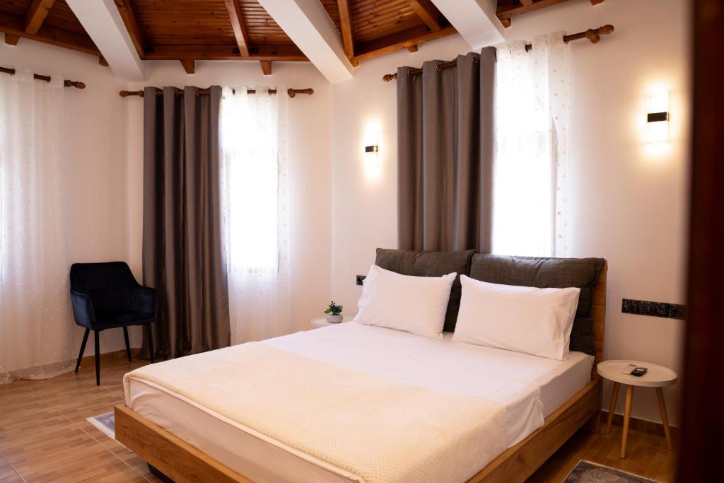 Postel nebo postele na pokoji v ubytování Villa EM