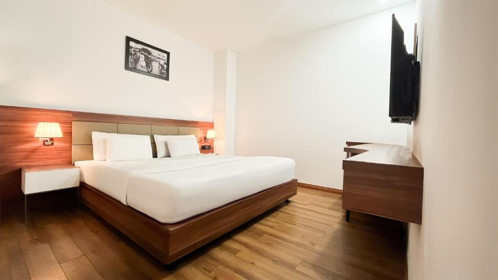 Posteľ alebo postele v izbe v ubytovaní A25 Hotel - 29 Lê Thị Hồng Gấm