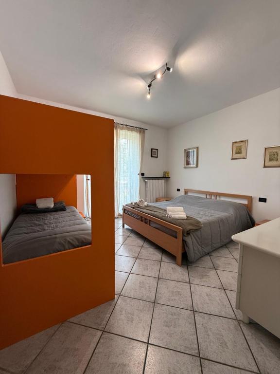 Postel nebo postele na pokoji v ubytování Ca Bilofer-7 min to Bergamo Airport