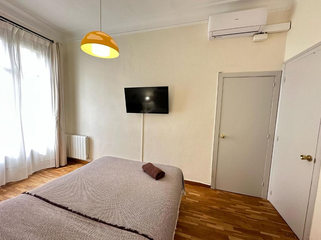 TV a/nebo společenská místnost v ubytování Rooms Aribau