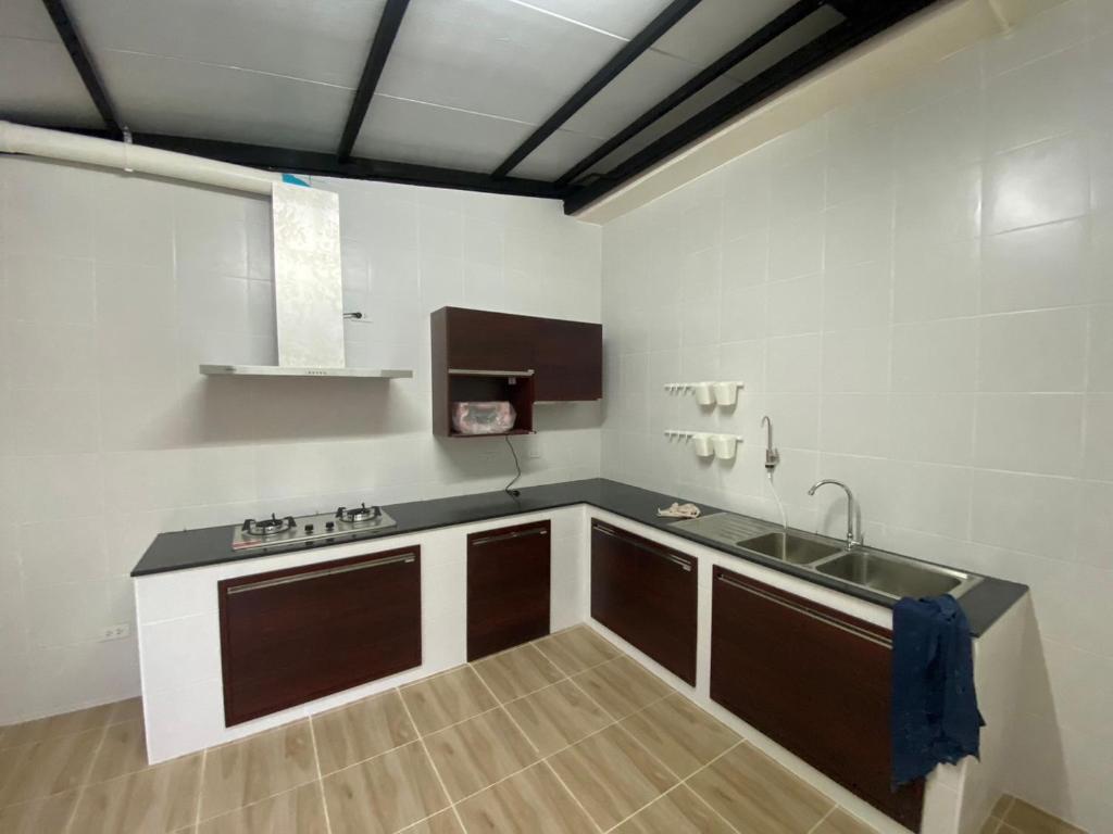 Η κουζίνα ή μικρή κουζίνα στο Homey Place 2