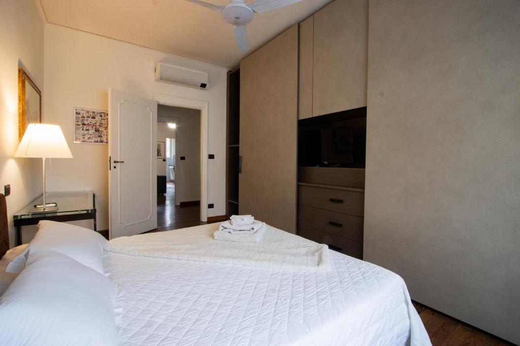 Ένα ή περισσότερα κρεβάτια σε δωμάτιο στο Boutique apartment in Centro città - WIFI