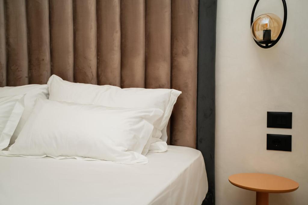 Postel nebo postele na pokoji v ubytování Diamar Suites