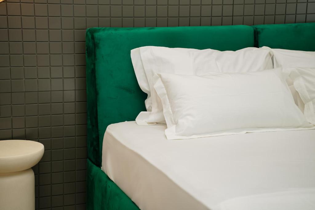 Postel nebo postele na pokoji v ubytování Diamar Suites
