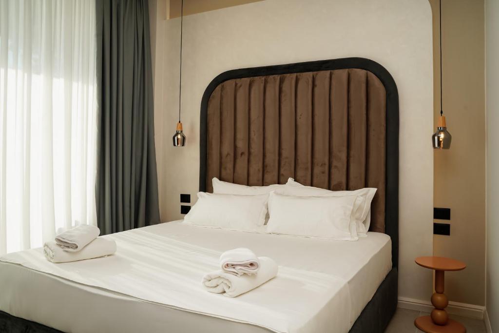 Postel nebo postele na pokoji v ubytování Diamar Suites