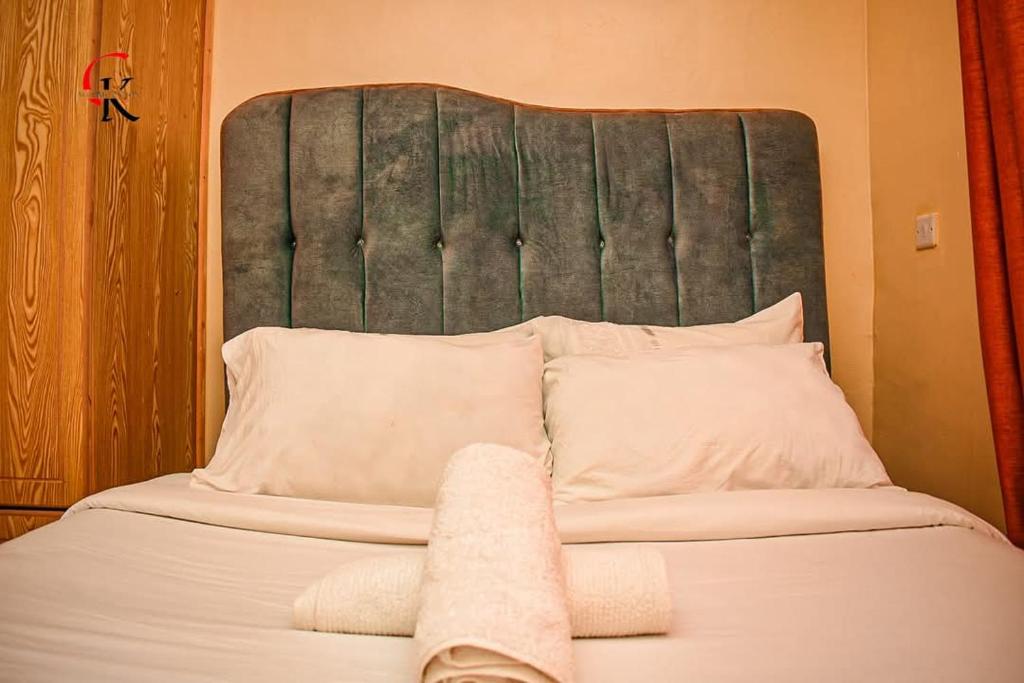 Postel nebo postele na pokoji v ubytování CK Accomodation