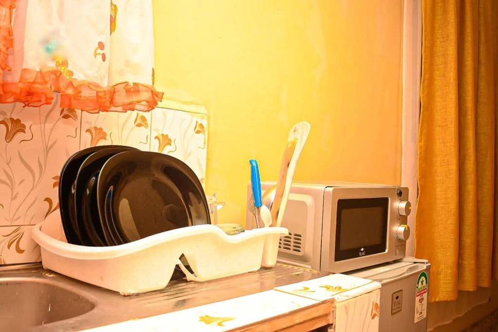 Kuchyň nebo kuchyňský kout v ubytování CK Accomodation