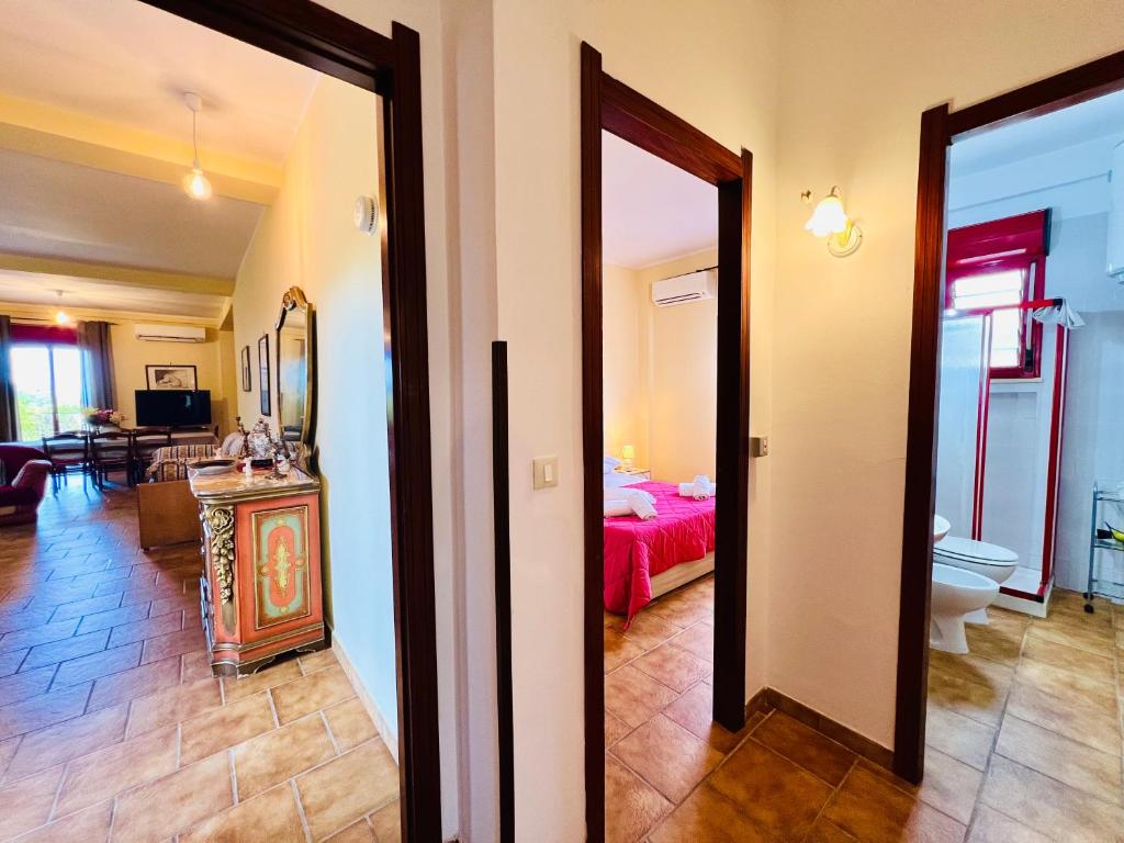 Postel nebo postele na pokoji v ubytování Villa Giada