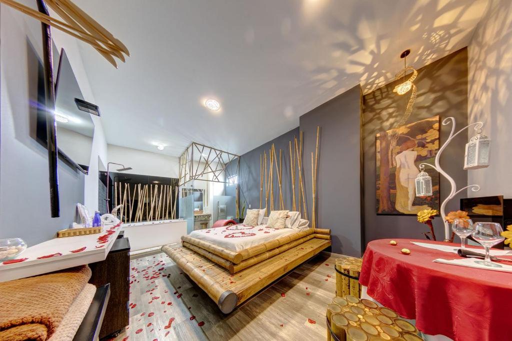 Postel nebo postele na pokoji v ubytování Hotel Zensual