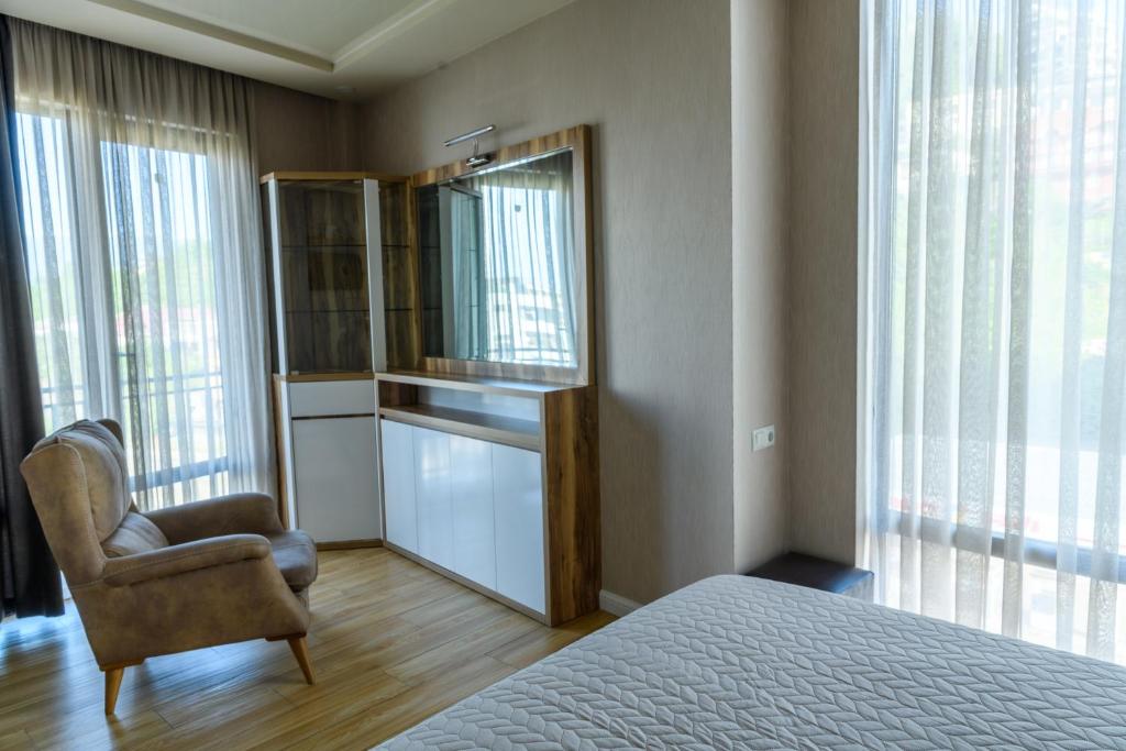 Postel nebo postele na pokoji v ubytování Hotel Sunny