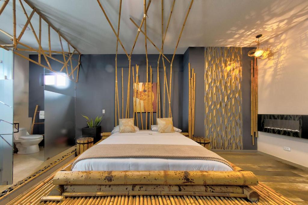 Postel nebo postele na pokoji v ubytování Hotel Zensual