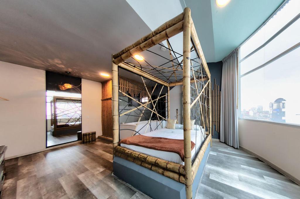Postel nebo postele na pokoji v ubytování Hotel Zensual