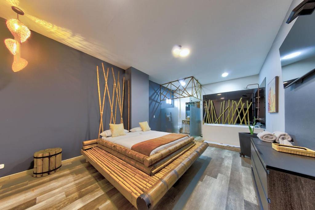 Postel nebo postele na pokoji v ubytování Hotel Zensual
