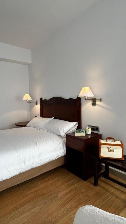 Postel nebo postele na pokoji v ubytování Aloha Espai Residencial