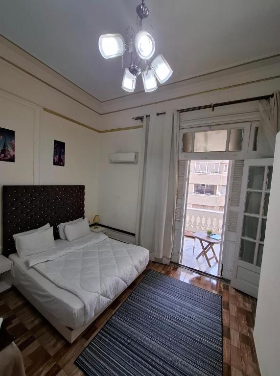 Postel nebo postele na pokoji v ubytování Pa la ce court
