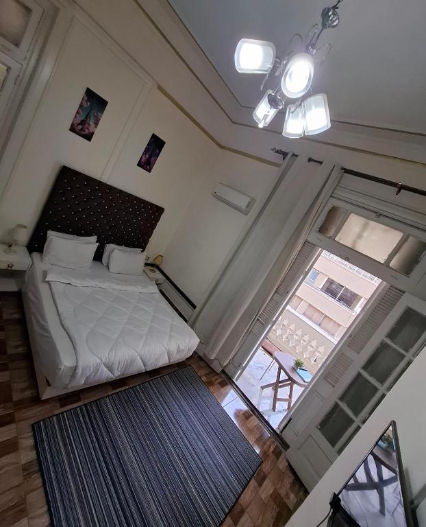 Postel nebo postele na pokoji v ubytování Pa la ce court