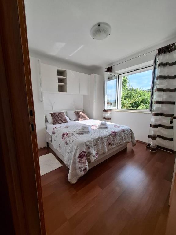 Postel nebo postele na pokoji v ubytování Apartman Gara