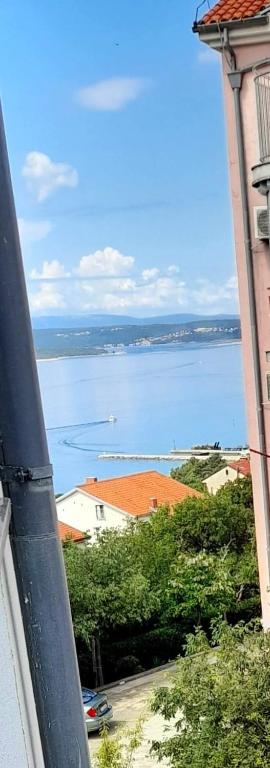 a view of a large body of water from a building at Apartman Lopar 2,Crikvenica in Crikvenica