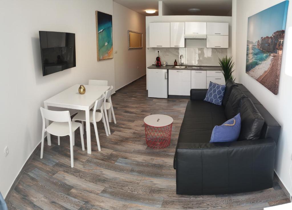 Køkken eller tekøkken på Melrose apartments