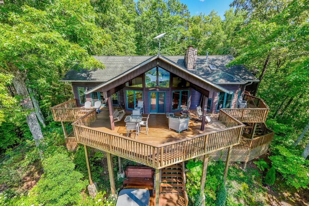 an overhead view of a house with a large deck at Majestic View cabin in Bryson City: 4BR, lake views, sleeps 10—your perfect mountain escape! in Bryson City