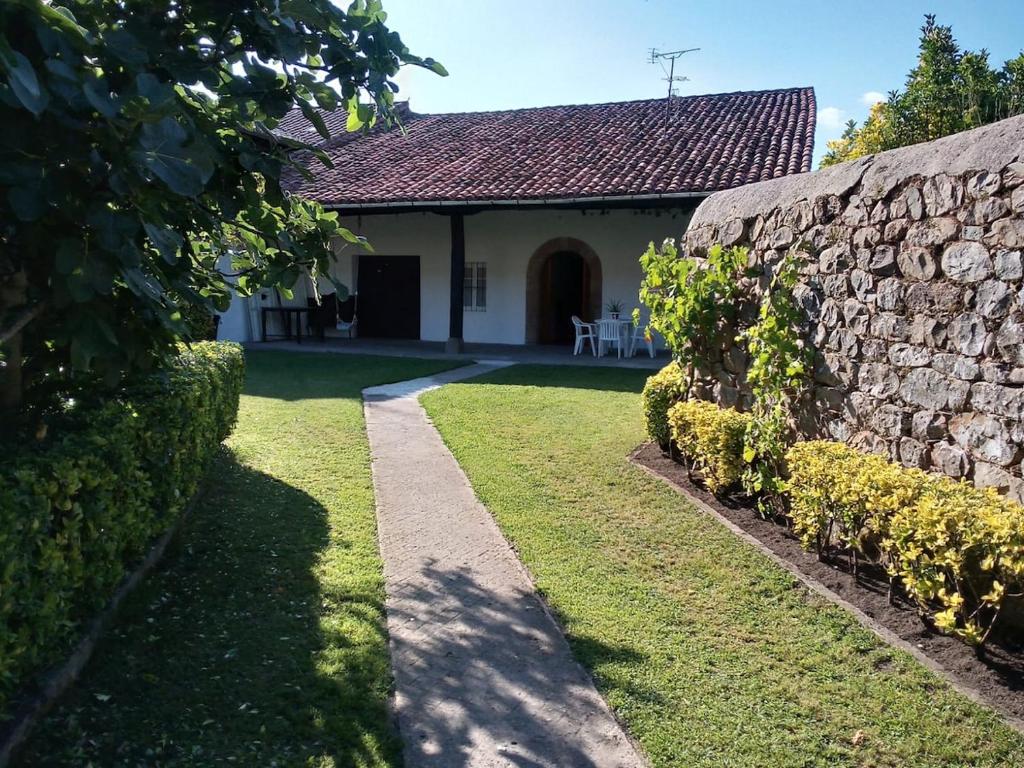 Κήπος έξω από το Casa rural El Portal