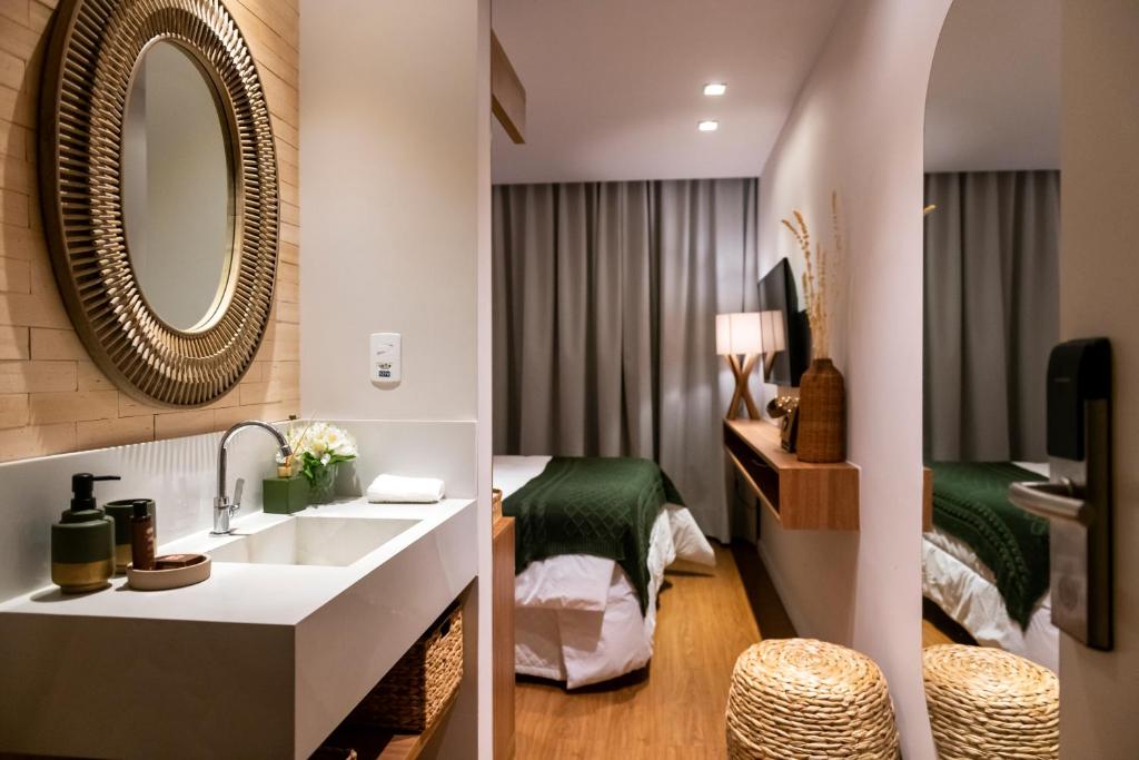 Postel nebo postele na pokoji v ubytování Canto Hotel
