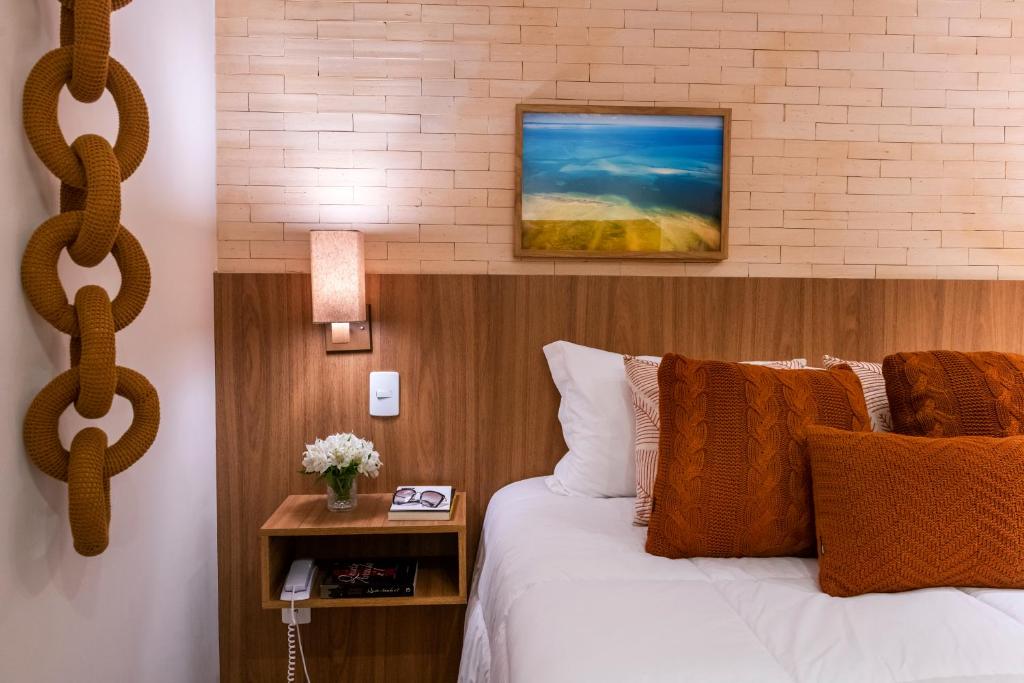 Postel nebo postele na pokoji v ubytování Canto Hotel