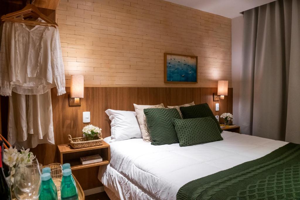 Postel nebo postele na pokoji v ubytování Canto Hotel