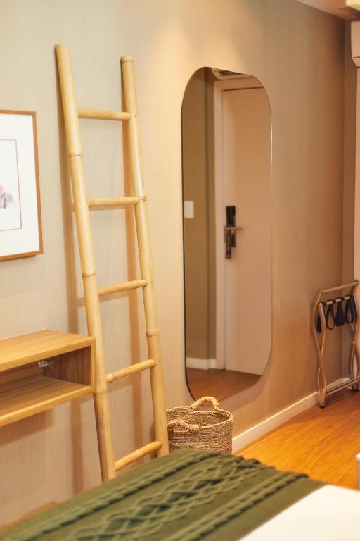 Postel nebo postele na pokoji v ubytování Canto Hotel