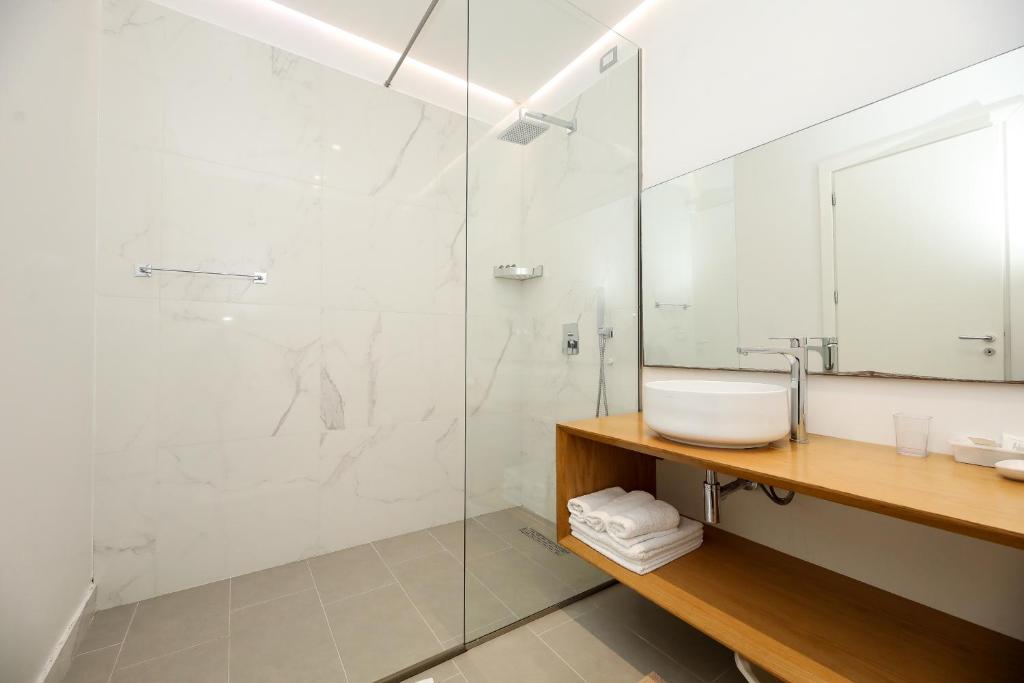 Koupelna v ubytování H&M Hotel