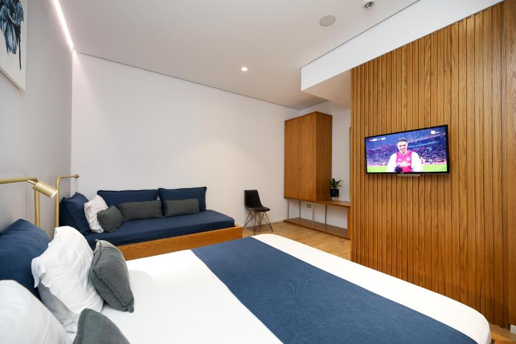 Postel nebo postele na pokoji v ubytování H&M Hotel
