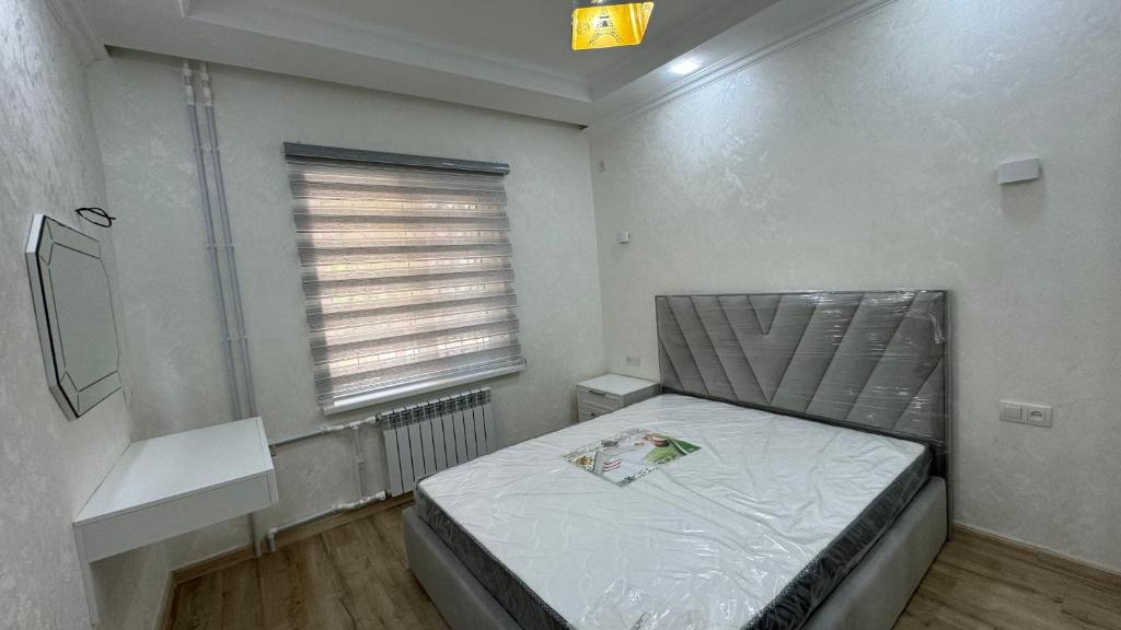 Postel nebo postele na pokoji v ubytování 9 kvartal