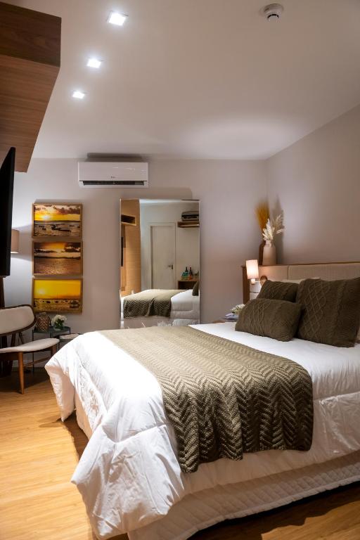 Postel nebo postele na pokoji v ubytování Canto Hotel
