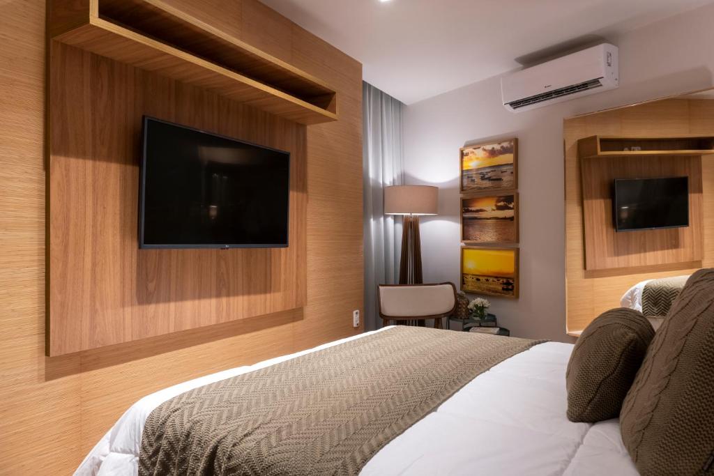 TV a/nebo společenská místnost v ubytování Canto Hotel