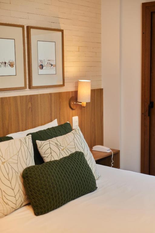 Postel nebo postele na pokoji v ubytování Canto Hotel