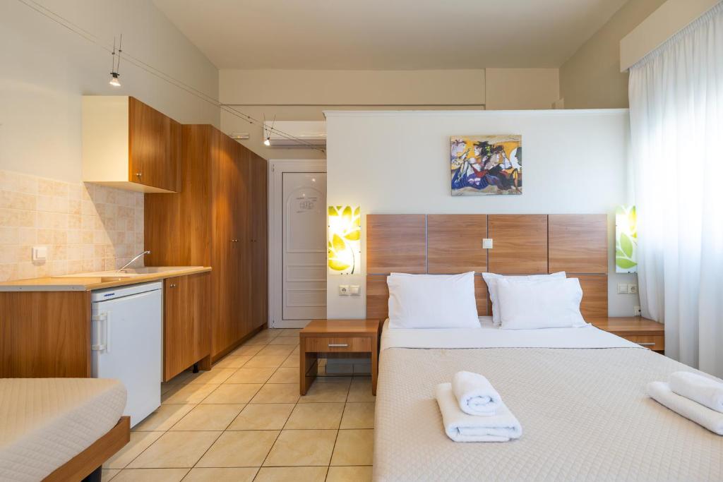Postel nebo postele na pokoji v ubytování Anassa Hotel