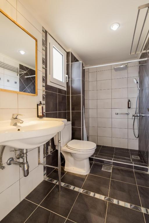 Koupelna v ubytování Anassa Hotel