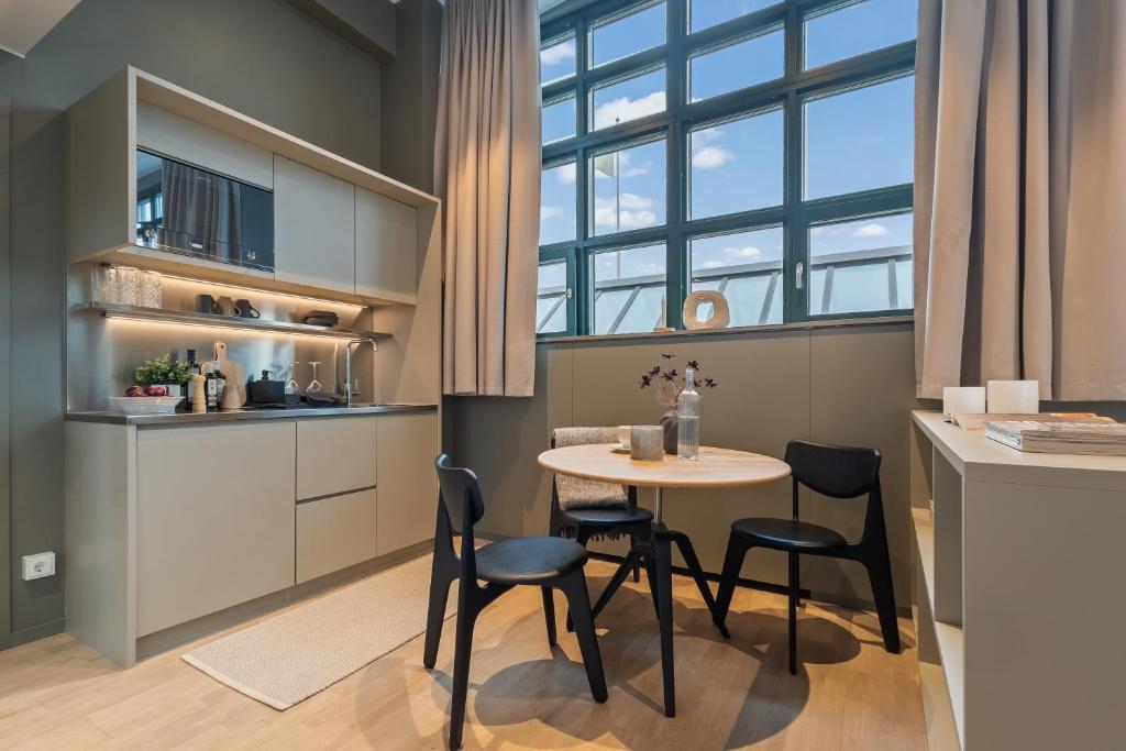 Η κουζίνα ή μικρή κουζίνα στο Unity Hammarby Sjöstad - A Studio Hotel