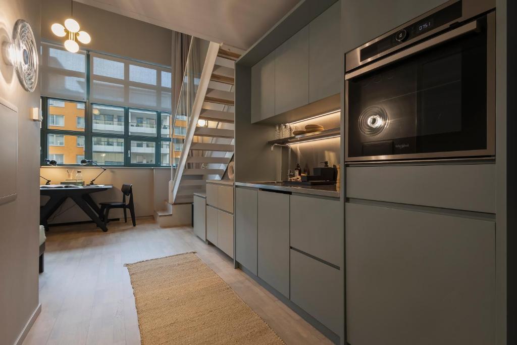 Η κουζίνα ή μικρή κουζίνα στο Unity Hammarby Sjöstad - A Studio Hotel