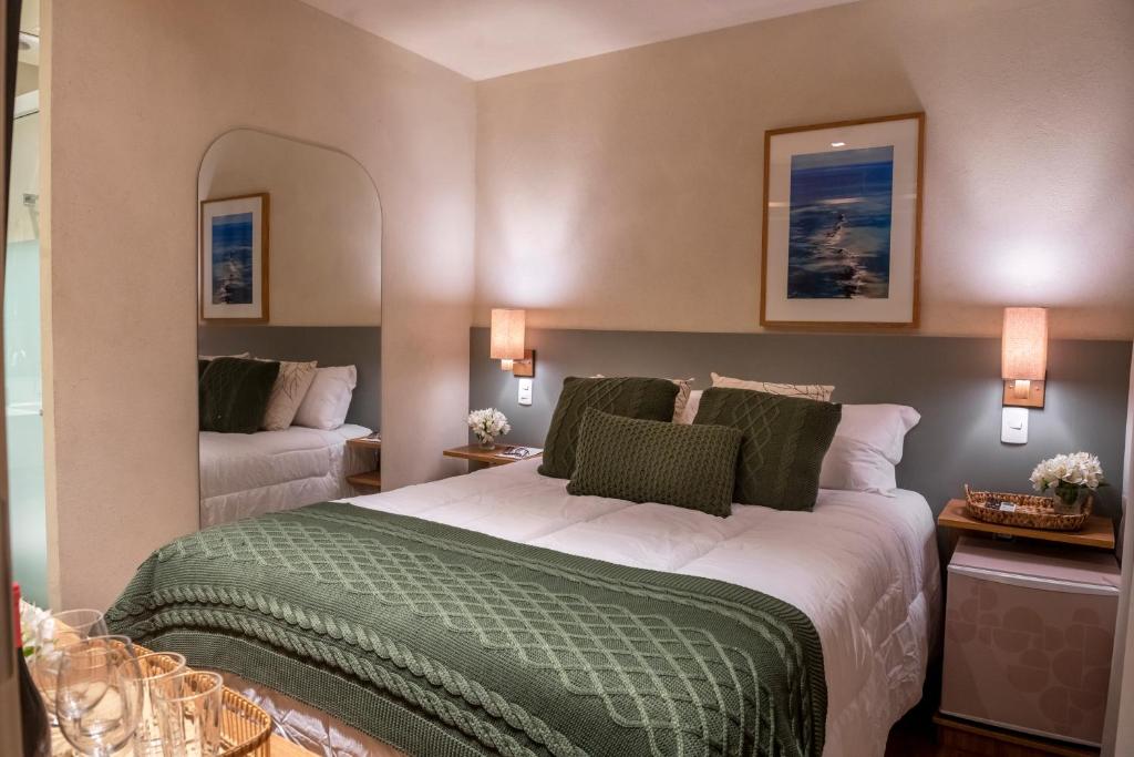 Postel nebo postele na pokoji v ubytování Canto Hotel