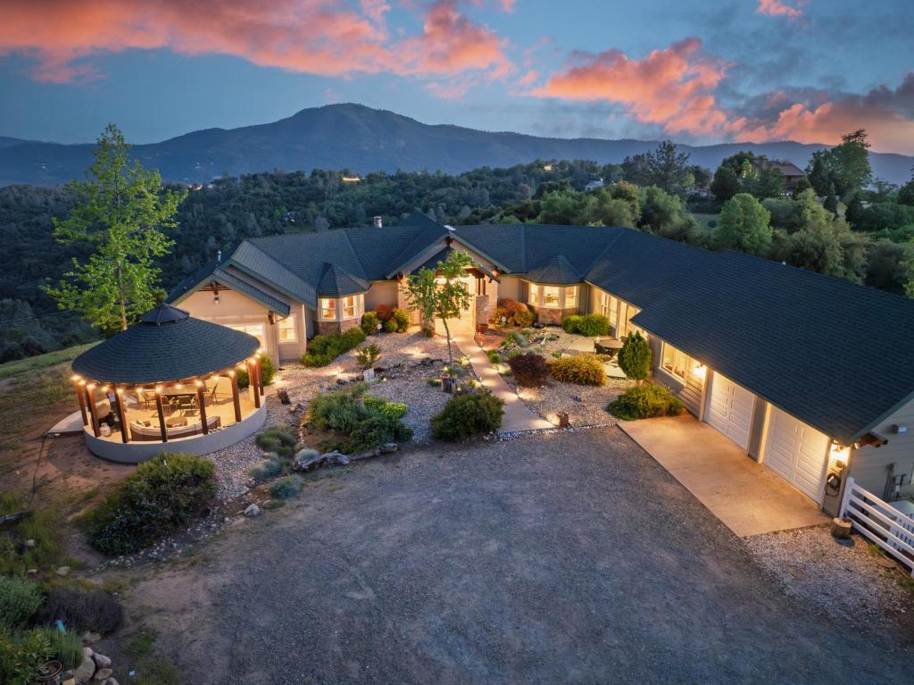 an aerial view of a home with a gazebo at Yosemite Cloudline Ridge with HUGE views-hot tub-game room! in Oakhurst